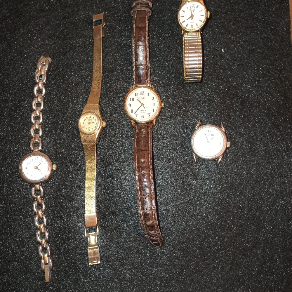 Elegant Watch Collection with Gold and Brown Accents